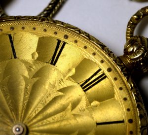 Close up of gold pocket watch